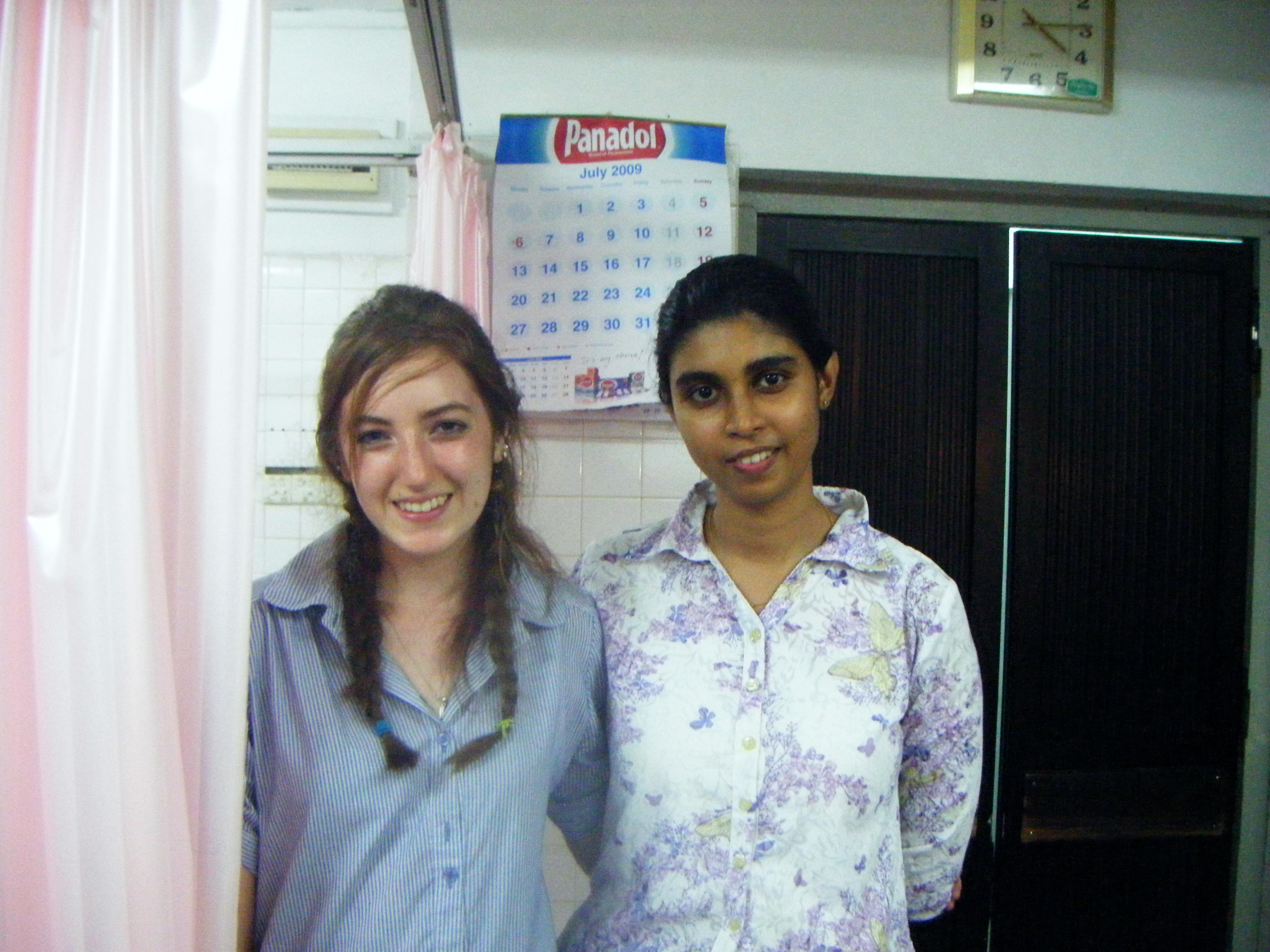 Projects Abroad Dentistry intern poses for a photo with a Healthcare staff member in a local hospital during her Dentistry work experience in Sri Lanka. Female Dentistry intern poses with a Healthcare staff member in Hospital during a Dentistry internship placement in Sri Lanka.